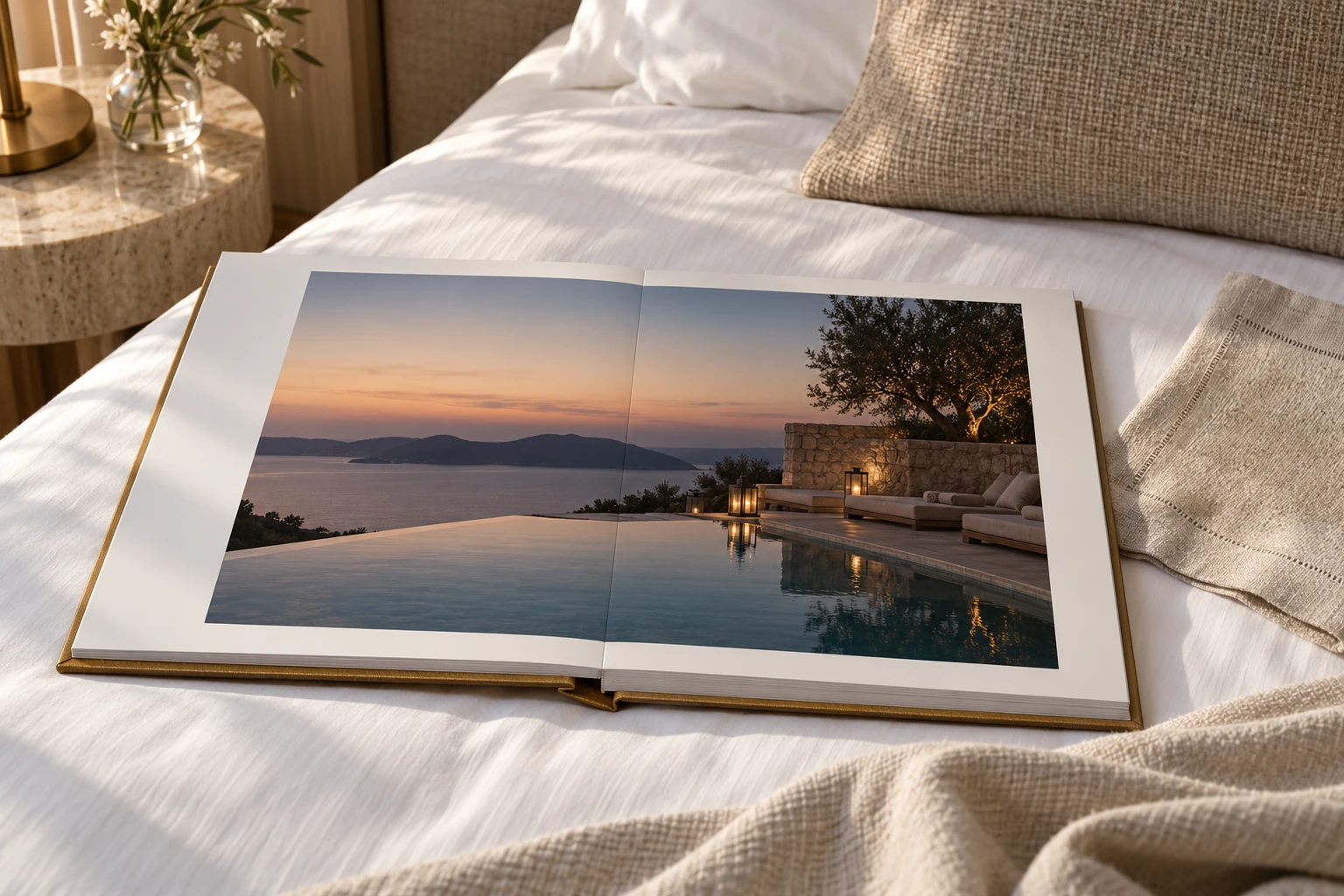 Custom hotel coffee table book by KONPOLI: In-room copy, open on the bed